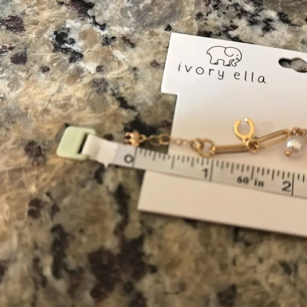 NWT ivory ella gold tone paper clip style charm bracelet